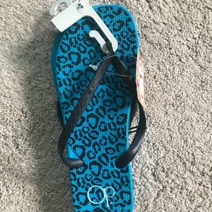 Blue animal print flip flops